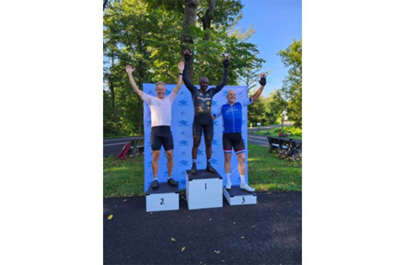Joelyn Joseph at centre after winning the 65 years plus category at the Aubrey Gordon Criterium race in the United States