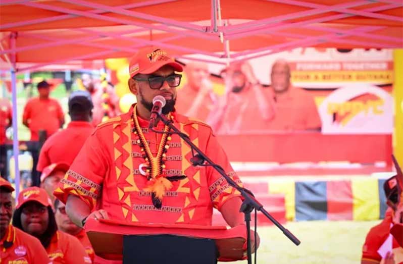 President Dr. Irfaan Ali addressing residents of Kamarang (DPI photo)