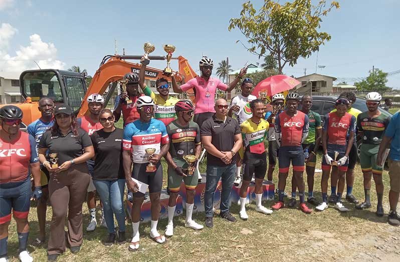 Winners of Farmsup Circuit Race; at centre in pink is open winner Jamal John