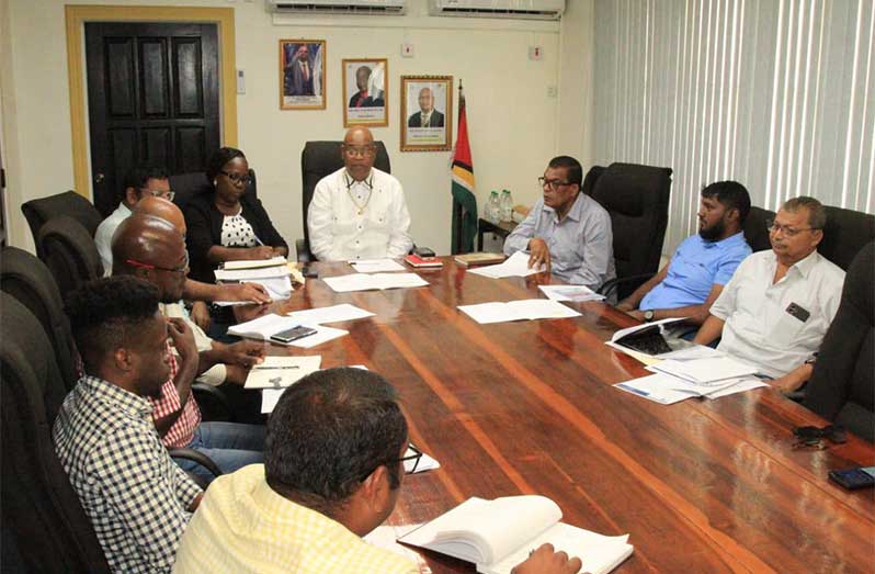 Minister of Public Works, Bishop Juan Edghill, together with Madanlall Ramraj, Minister within the Ministry of Public Works, met with contractors and project engineers for a status update on the ongoing construction of the Kingston Goods Wharf, Port Kaituma Stelling, Kumaka Stelling, and Morawhanna Stelling
