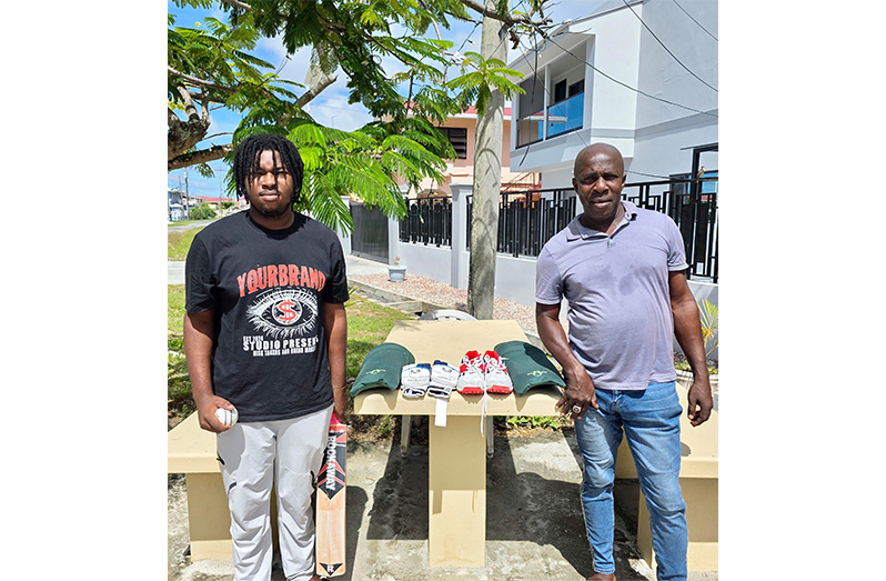 Kyle Gibson, (left) and father Cyrus pose with the items