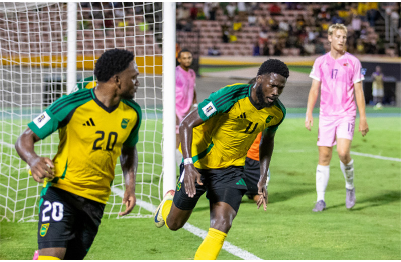 Jamaica’s goal-scorer Shamar Nicholson (centre) and Cephas Cooper (left) celebrate after scoring against Bermuda. (Photo courtesy CONCACAF)