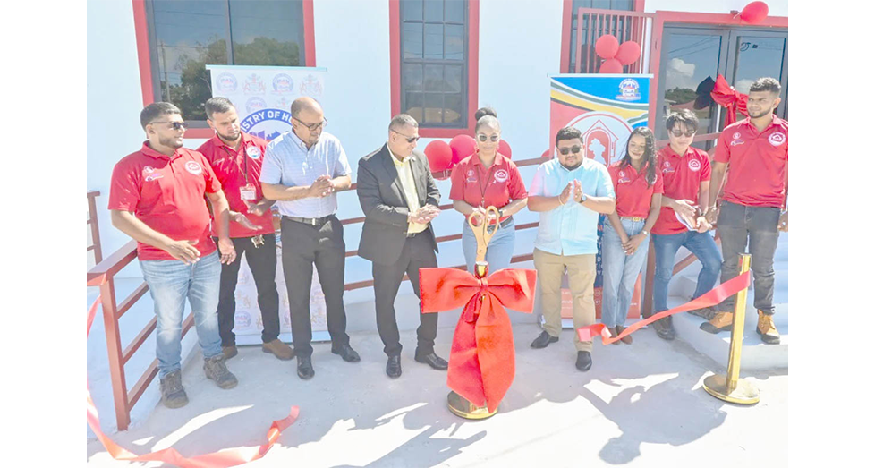 Minister Collin Croal at the commissioning of the new housing office (DPI photo)
