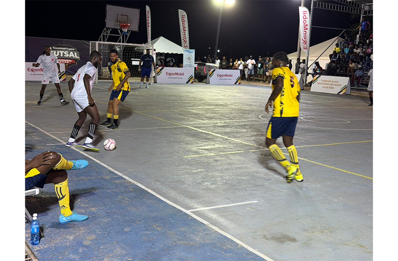 YMCA A (yellow) vs Figgy FC (white)