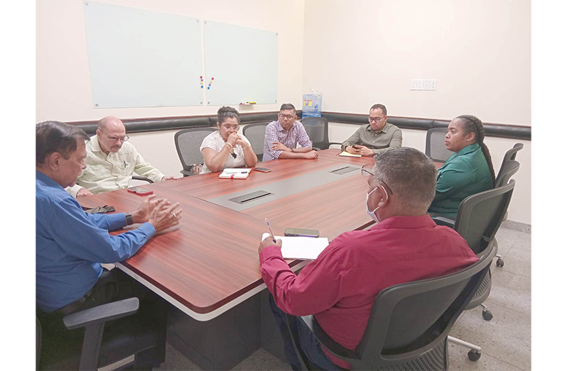 Director General Director General of the Ministry of Health, Dr. Vishwa Mahadeo (at the head table) and his team meeting with officials at the De Kinderen Hospital