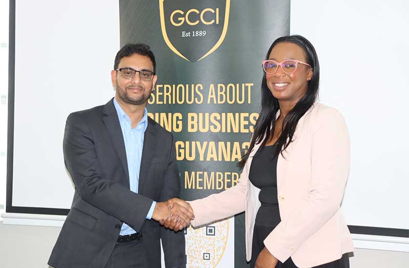 Minister of Public Service, Government Efficiency and Implementation Zulfikar Ally and GCCI President, Kathy Smith