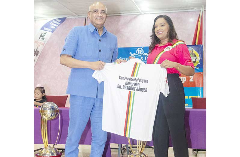 Flashback: Vice-president Dr Bharrat Jagdeo receives a token of appreciation from GSCL Secretary Telesha Ousman Yamin during the launching of the 2024 Vice-president Softball Cup