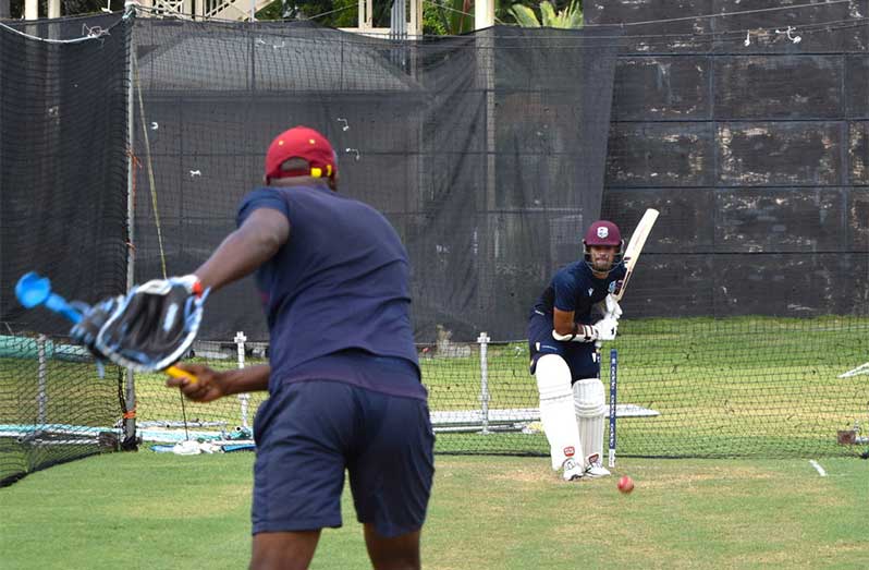 Academy Assistant Coach Rohan Nurse with opening batter Tagenarine Chanderpaul in the nets