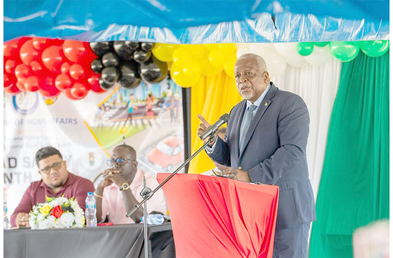 Prime Minister, Brigadier (Ret’d) Mark Phillips, performing the functions of President, delivers remarks at the launch of Road Safety Month 2025 held at the Bush Lot Community Centre, Region Five