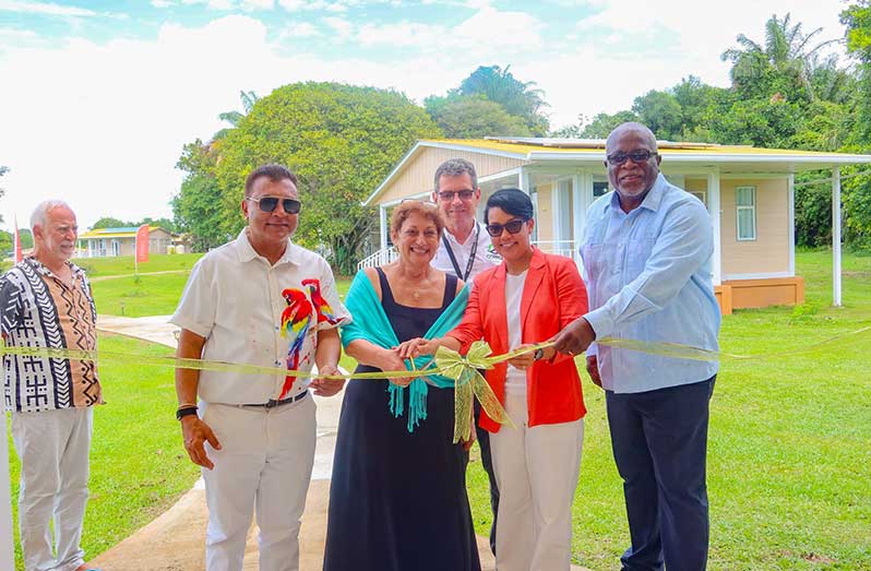 From Right, Prime Minister Brigadier Mark Phillips; Minister of Tourism, Industry and Commerce Susan Rodrigues; Chief Executive Officer of the Correia Group of Companies, Michael Correia; Director of the Tourism and Hospitality Division Correia Group of Companies, Andrea deCaires; and Chief Investment Officer and Agency Head of the Guyana Office for Investment (Go-Invest), Dr. Peter Ramsaroop during the ribbon cutting for the executive conference cottages at Baganara Island Resort ( Go-Invest photo)