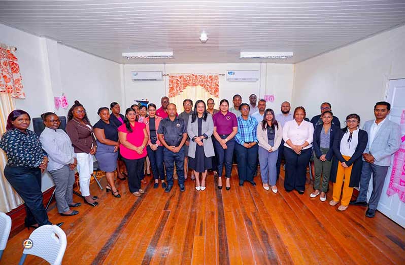 Human Services Minister Dr. Vindhya Persaud  and staff undergoing training on the GSSS digital platform