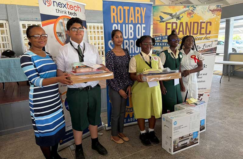The top three winners with their teachers