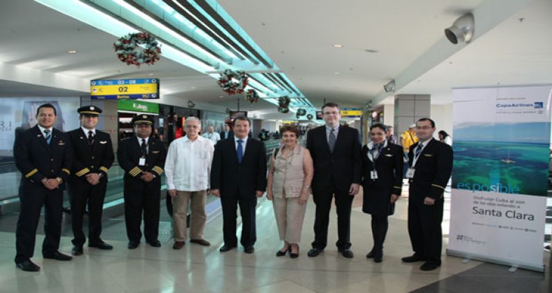 With Crew members of COPA (L_R) 2nd Chief of Mission of the Embassy of Cuba in Panama, Alberto Garcia; Vice Minister of Foreign Trade of Panama, Néstor González; Director of Cuba Consul in Panama, Hilda Garcia and Senior Director of Government Relations and Alliances Copa Airlines, Pablo De La Guardia