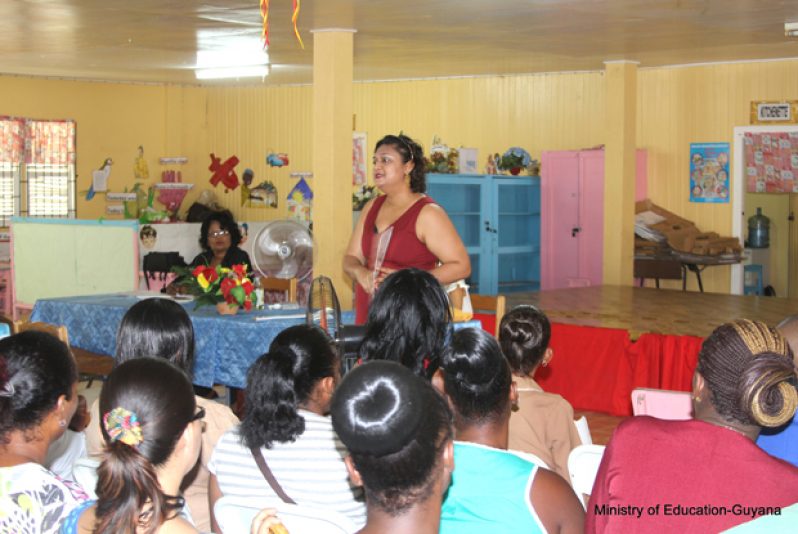Minister of Education Priya Manickchand speaking with Smyth Street Nursery’s Year One parents