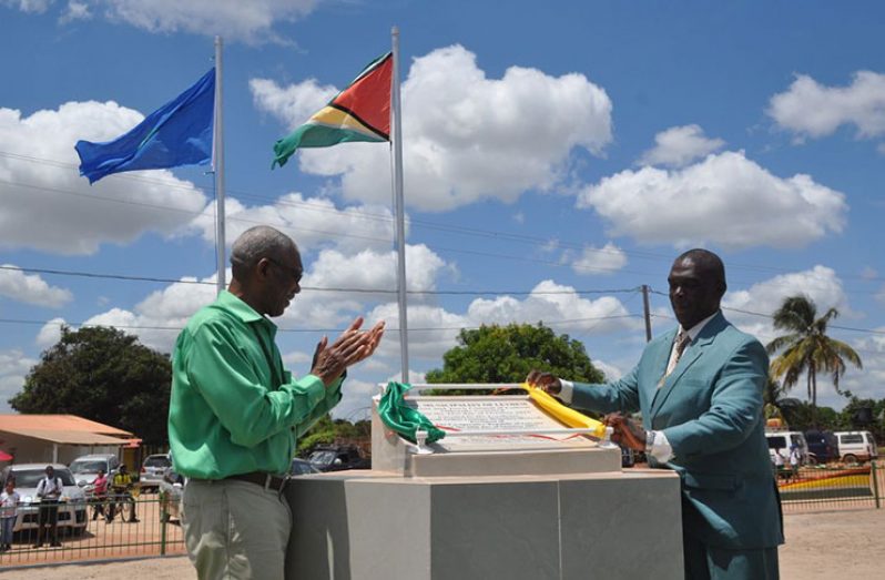 President David Granger applauds as the plaque declaring Lethem a town was unveiled by the town’s Mayor, Mr Carlton Beckles