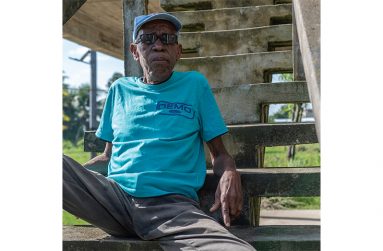 Keith James as he displays his home-made coconut oil (
Delano Williams photos)