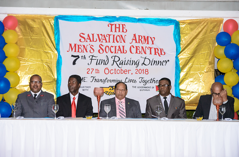 Mr. Diego Alphonso, Master of Ceremonies; representative of the Organisation of American States in Guyana, Ambassador Jean Ricot Domeus; Moses Nagamootoo, Prime Minister of Guyana; Major Matignol St. Lot, Divisional Commander of the Salvation Army; and of Edward Boyer, Chairman of the Salvation Army’s Advisory Board