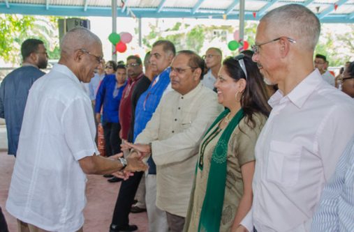 President David Granger and Prime Minister Moses Nagamootoo exchange pleasantries at the event