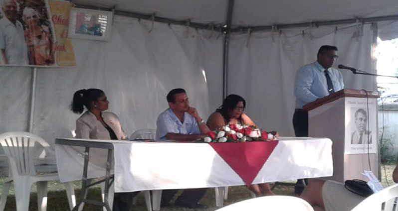 At the Evening of Reflections Wednesday evening at the Jagans’ Bel Air homestead. Seated as the head table are, from left: Ms. Sheila Verasammy; Mr. Hydar Ally; and Mrs. Elisabeth Harper. On the floor is PPP Bel Air/Prashad Nagar Group’s Maxim Ali