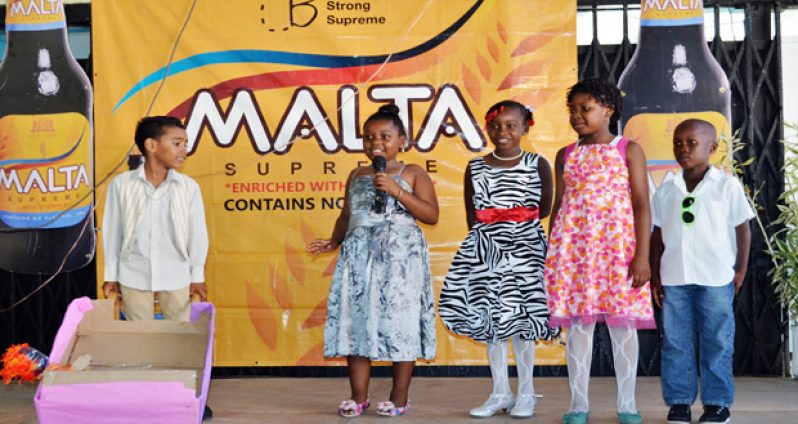 A  few of the children participating in a skit.