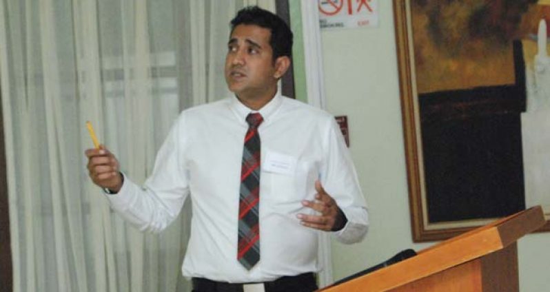 Mr. Nicholas Persaud of he Advancing Partners and Communities Guyana during his presentation yesterday