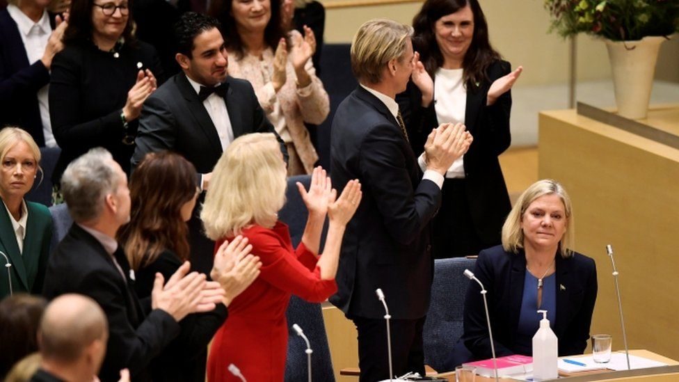 Many MPs gave the new prime minister (right) a standing ovation in the Riksdag. 

Photo taken from BBC, credited to Reuters