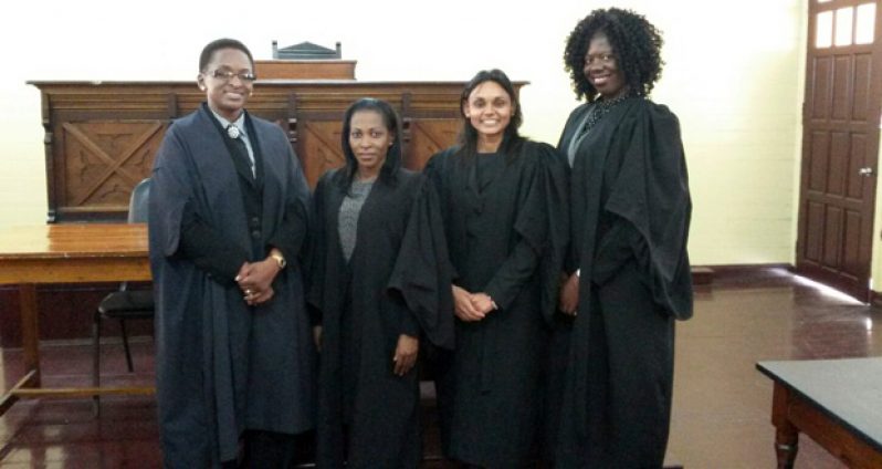 Following the Admission Ceremony yesterday, Justice Barlow entertained, in court, the new lawyer, Ms Ria Mankee-Sookram and her friends.
Left to right are Madam Justice Barlow, Mrs. Ramlall, Miss Ria N. Mankee-Sookram, and Miss Wanda Fortune