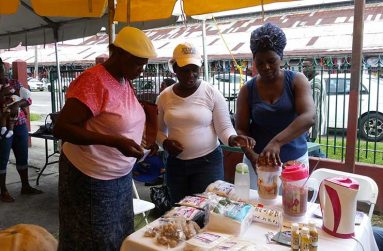 Senior citizens sample hot porridge and other desserts at Braf’s Manufacturing
