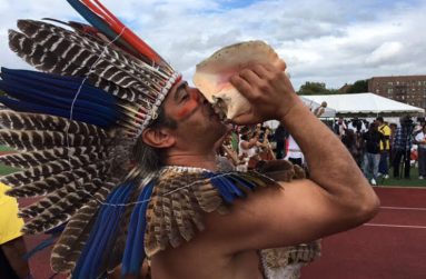 A member of the Guyana Karao Indigenous Group from the South Rupununi, Region Number Nine blowing the shell horn at the  GCA Family Fun Day last Sunday. (Photo by Francis Quamina Farrier)