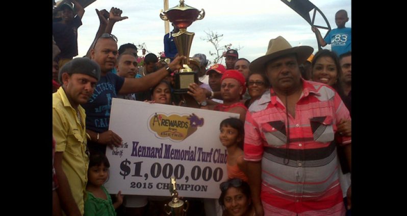 Connections of Shariff Racing Stable collect the winning trophy and cheque for Spite Fire’s victory in the feature D and Lower race.