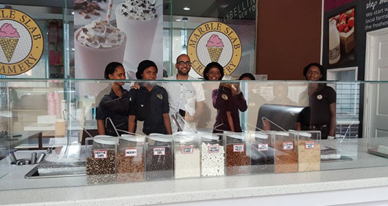 Marketing Director Navin Singh with staff at the official opening of Marble Slab Creamery at Footsteps Mega Store at Camp and Regent Streets