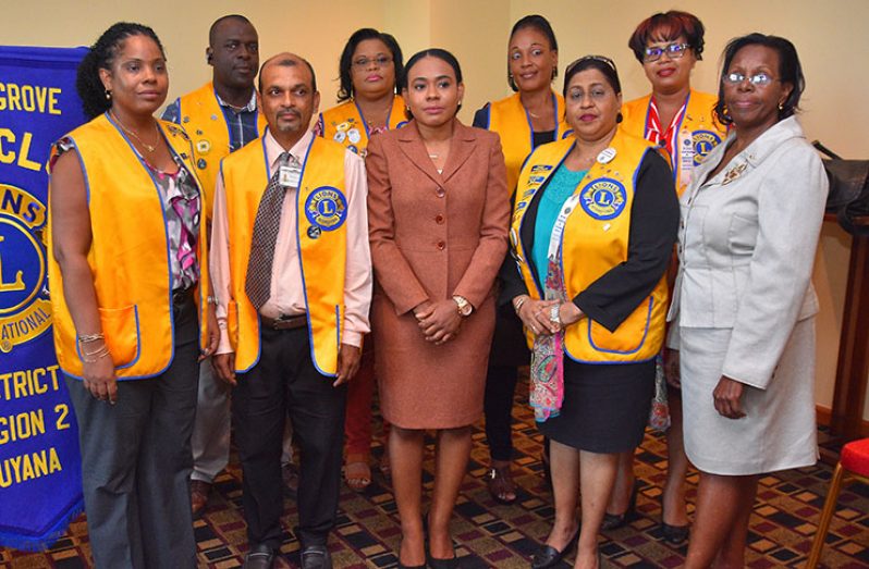 Members of the Lions Club of Diamond/Grove share a moment with the GPHC Chairperson Kesaundra Alves (centre)