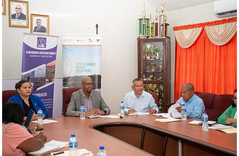 Speakers at the head table are: Candace Phillips of GTA, Denzil Roberts, Chief Fisheries Officer, Ministry of Agriculture; and Dr. Richard Blair, Advisor Caricom Agriculture- Food System
