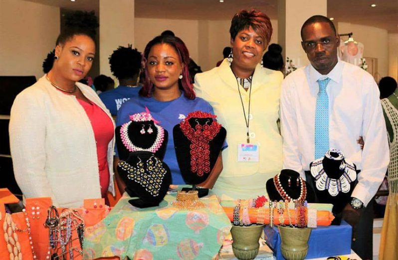 Fiona (second from right) with her husband, Troy, and her helpers at a recent expo