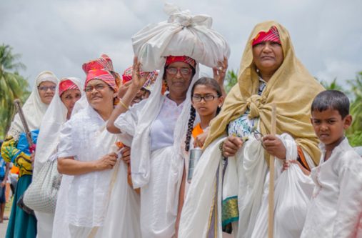 Persons re-enacted the arrival of the first East Indian settlers at Highbury.