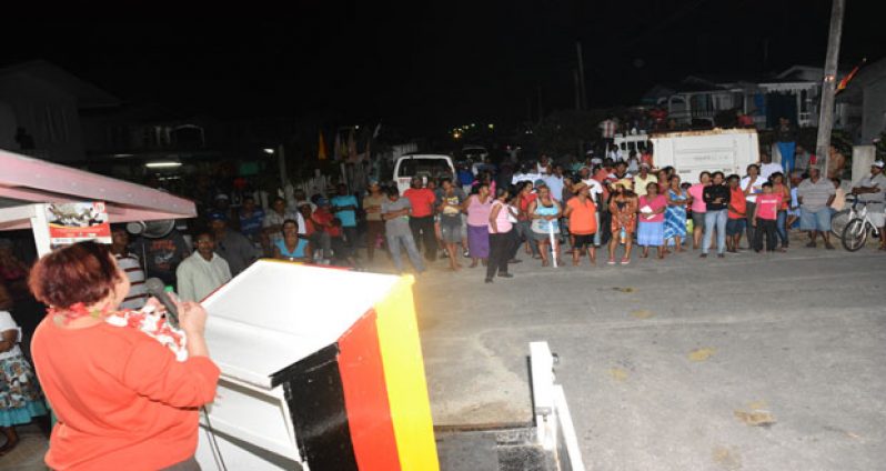 PPP/C Stalwart, Gail Teixeira informing the sizeable crowd last evening about the hostility of APNU+AFC supporters  (Samuel Maughn photo)