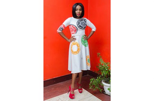 Keep it chic in this white three-quarter flair hand-painted midi dress. Featuring a jewel-neckline, removable belt, easily take this look from day to night with bangles and strappy sandals.