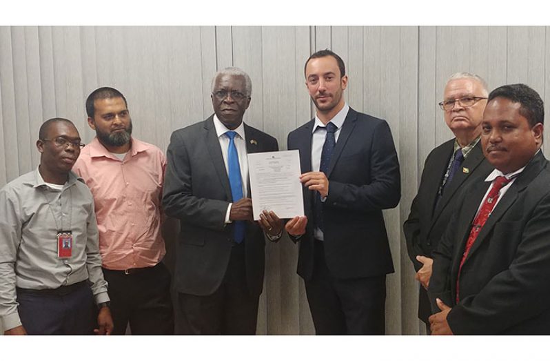 The Guyana Civil Aviation Authority has officially licensed the helideck aboard the Liza Destiny.
Here Director General, Lieutenant Colonel (ret’d), Egbert Field hands over the official license to
Transportation and Logistic Consulting (TLC) Country Manager, Mr. Mathieu Guiraud.