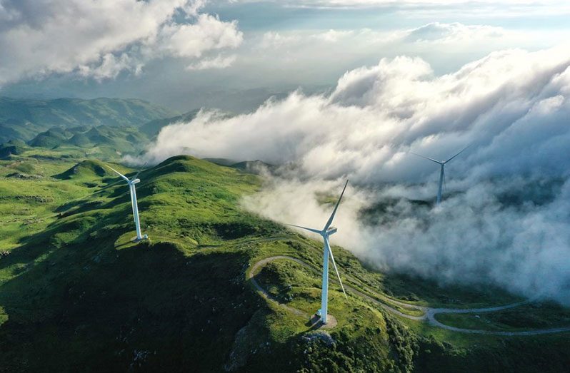 Aerial photo taken on August 19, 2020 shows wind turbines in Jiucaiping scenic spot in southwest China's Guizhou Province. (Xinhua/Liu Xu)