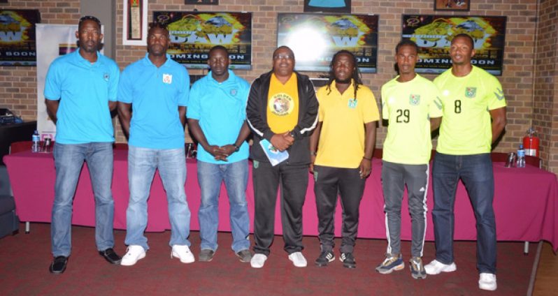 Players and other officials from both teams pose for this Delano Williams photo after yesterday’s Press Conference at the 704 Sports Bar.