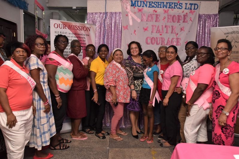 First Lady, Mrs. Sandra Granger (seventh from right), Manager of Muneshwers Limited, Ms. Vanita Muneshwer (fourth from right) and Founder of the Giving Hope Foundation, Dr. Latoya Gooding (sixth from left) are pictured with some of the women who participated in the Spa Day and Tea Party at Muneshwers Limited.