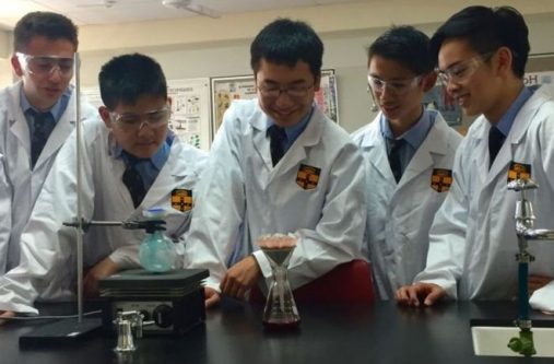 The Sydney students at work in their high school laboratory