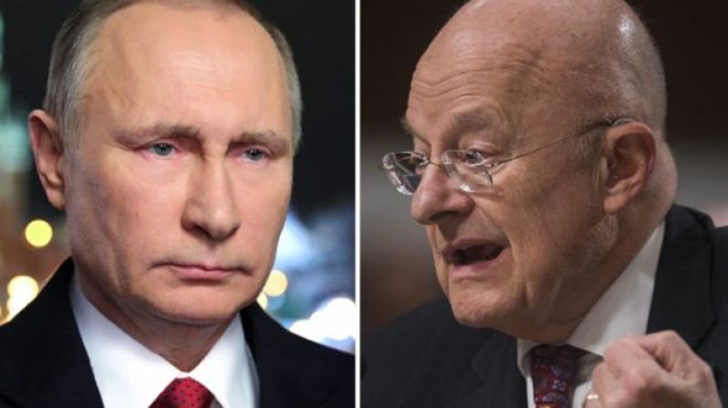 James Clapper (right) said Russia's President Vladimir Putin's "motivation" will be revealed in a report next week