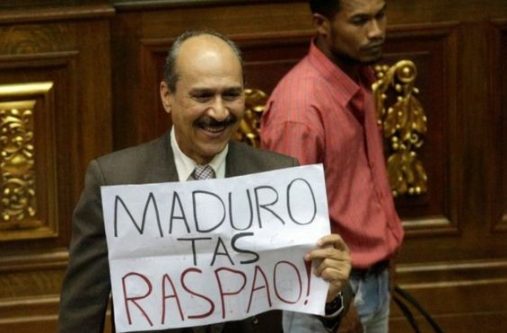 An opposition lawmaker held up a sign reading: "Maduro, you have failed"