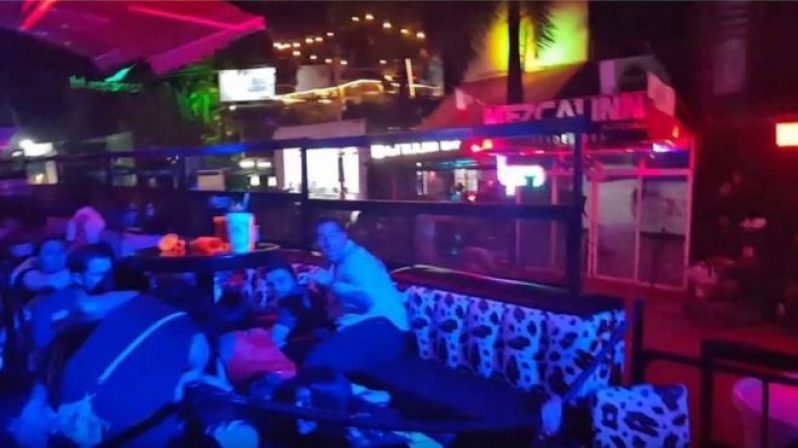 People inside the club ducked and hid behind furniture when the shots rang out