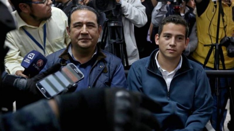 Samuel Morales (left) and Jose Manuel Morales Marroquin (right), brother and son of Guatemalan President Jimmy Morales, appeared in court on Wednesday