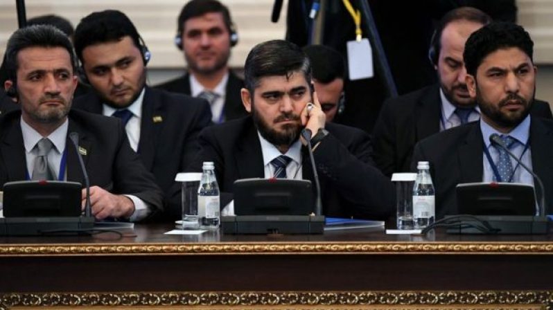 Mohammed Alloush (centre) said the rebels were "men of peace, and at the same time knights of war"