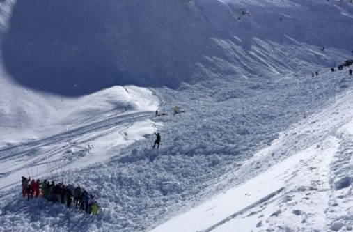 Rescue workers are continuing to search for people swept down the mountain by the avalanche