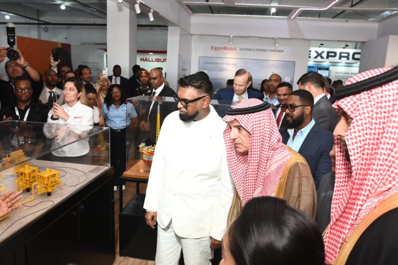 President Dr Irfaan Ali with Adel bin Ahmed Al-Jubeir, Minister of State for Foreign Affairs, Member of the Council of Ministers and Climate Envoy, the Kingdom of Saudi Arabia at the Expo [Delano Williams photos]