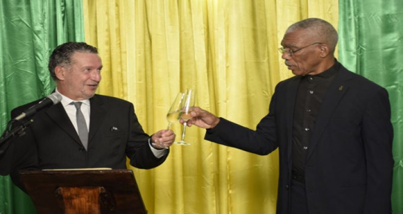 President David Granger and Brazilian Ambassador, His Excellency Lineu Pupo de Paula proposing a toast to the good health of President Dilma Rouseff, President of the Federative Republic of Brazil, on the occasion of the country's 193rd Independence Anniversary